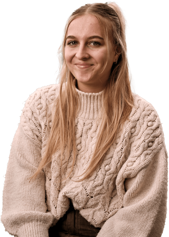 woman in jumper smiling